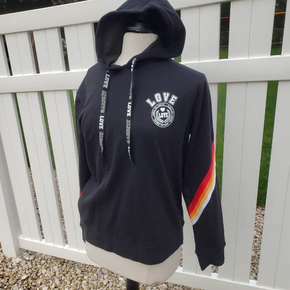 black hoodie with yellow stripe